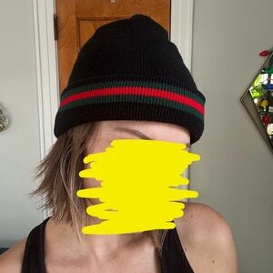Green and red striped beanie ;) fuzzy and insulated interior. One size